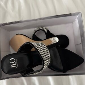 Jennifer Lopez Black Heels with Silver Accents